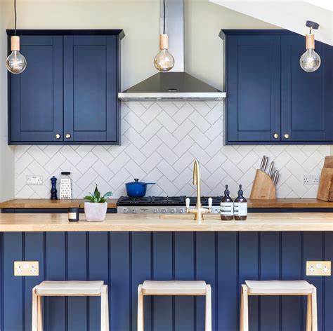 blue shaker style kitchen cabinets.